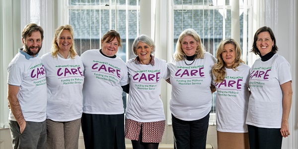 Seven volunteers in charity T-shirts